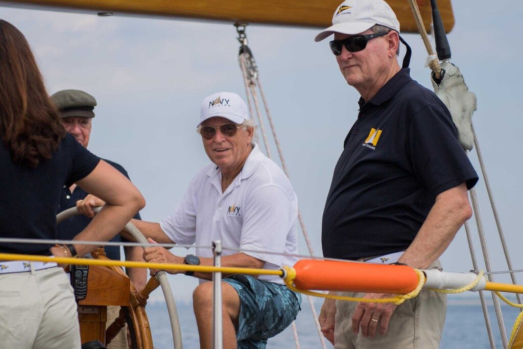 Singer Jimmy Buffett, center, and Naval Academy professor Jim Reightler teaching midshipmen to sail aboard the schooner Summerwind.