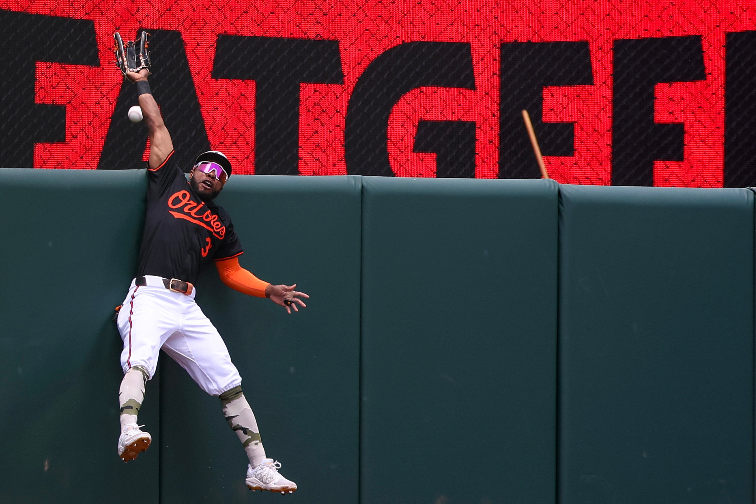 Orioles outfielder Jorge Mateo tries unsuccesfully to prevent a home run in the second inning of Sunday’s loss to Washington.