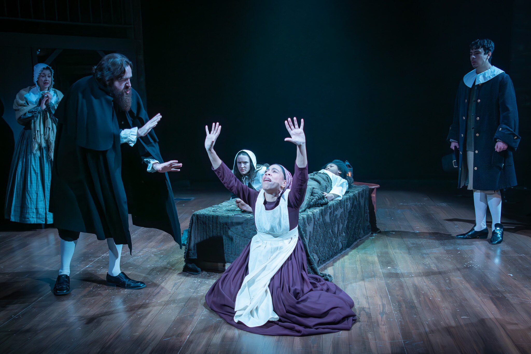 Shayna Freedman as Anna Putnam and Mitchell McCollum as the Rev. John Hale rehearse a scene with other members of the cast of "The Crucible," a new production by the Classic Theatre of Maryland.