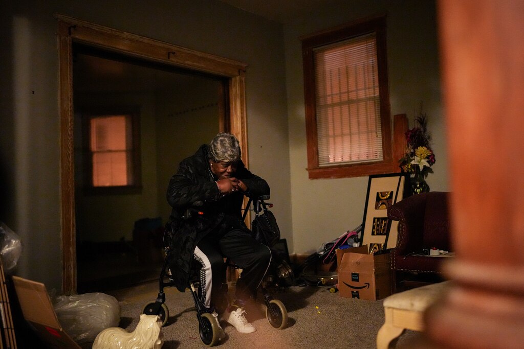 Bonita Anderson is interviewed inside her home in Baltimore, Md. on Wednesday, December 11, 2024. Anderson is one of many Baltimore residents at risk of losing their homes due to tax sale because of city errors.