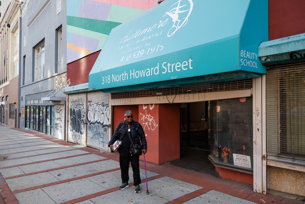 Derald Queen, the principal at the Baltimore Studio of Hair Design on Howard Avenue, heads home after work. Queen studied under the late Larry Sisserman and has been affiliated with the studio since.