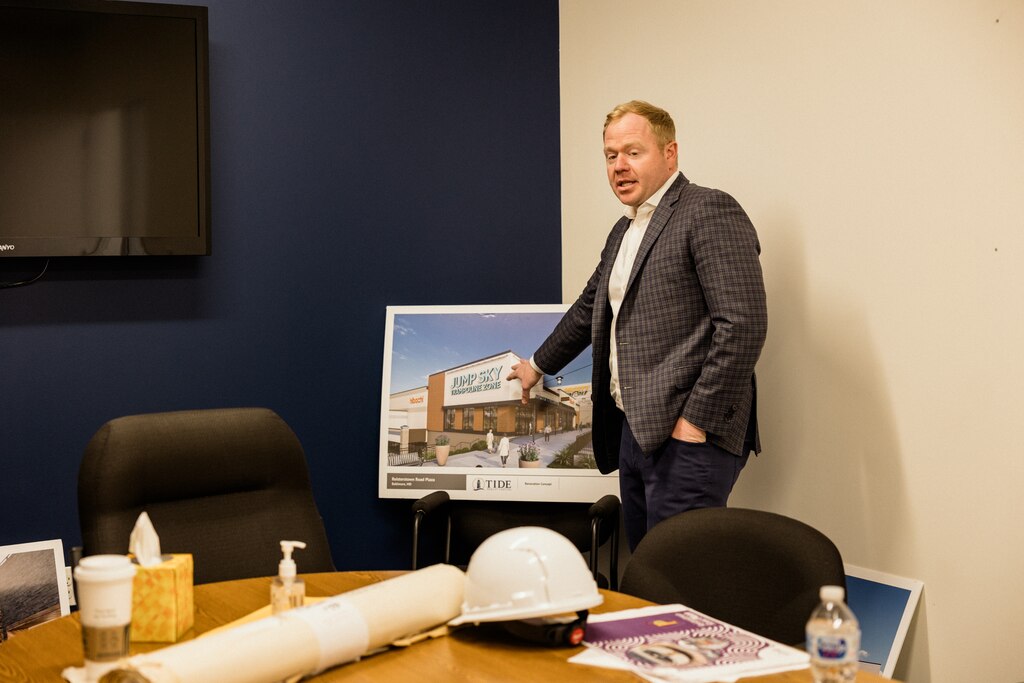 BALTIMORE, MD - FEB 4, 2025: Aaron Loeb, the president of Tide Realty Capital, shares renderings for the Reisterstown Road Plaza, a mall they are planning to revitalize in Baltimore, Maryland.