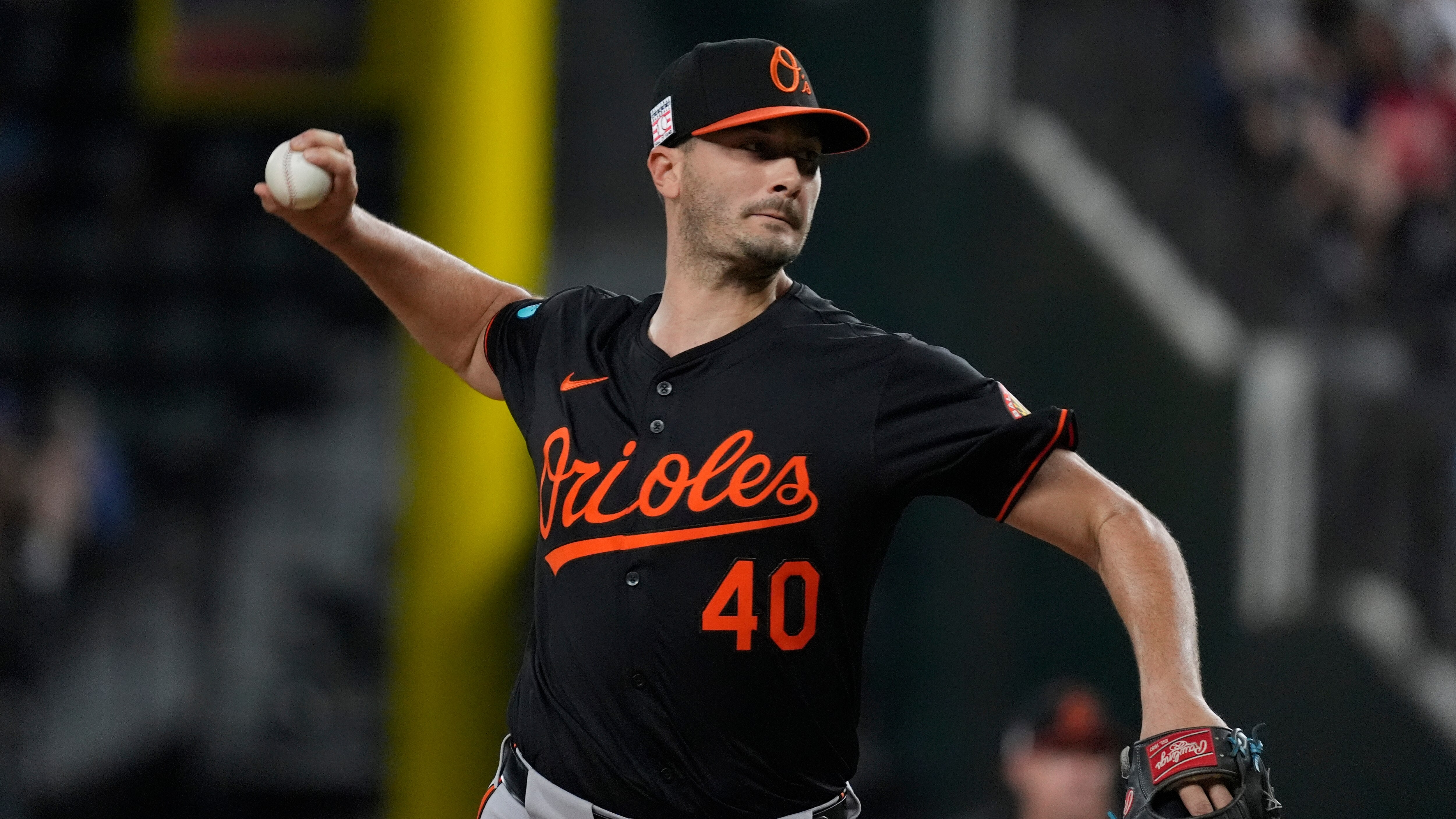 Baltimore Orioles pitcher Burch Smith (40) throws during a baseball game against the Texas Rangers in Arlington, Texas, Friday, July 19, 2024. (AP Photo/LM Otero)