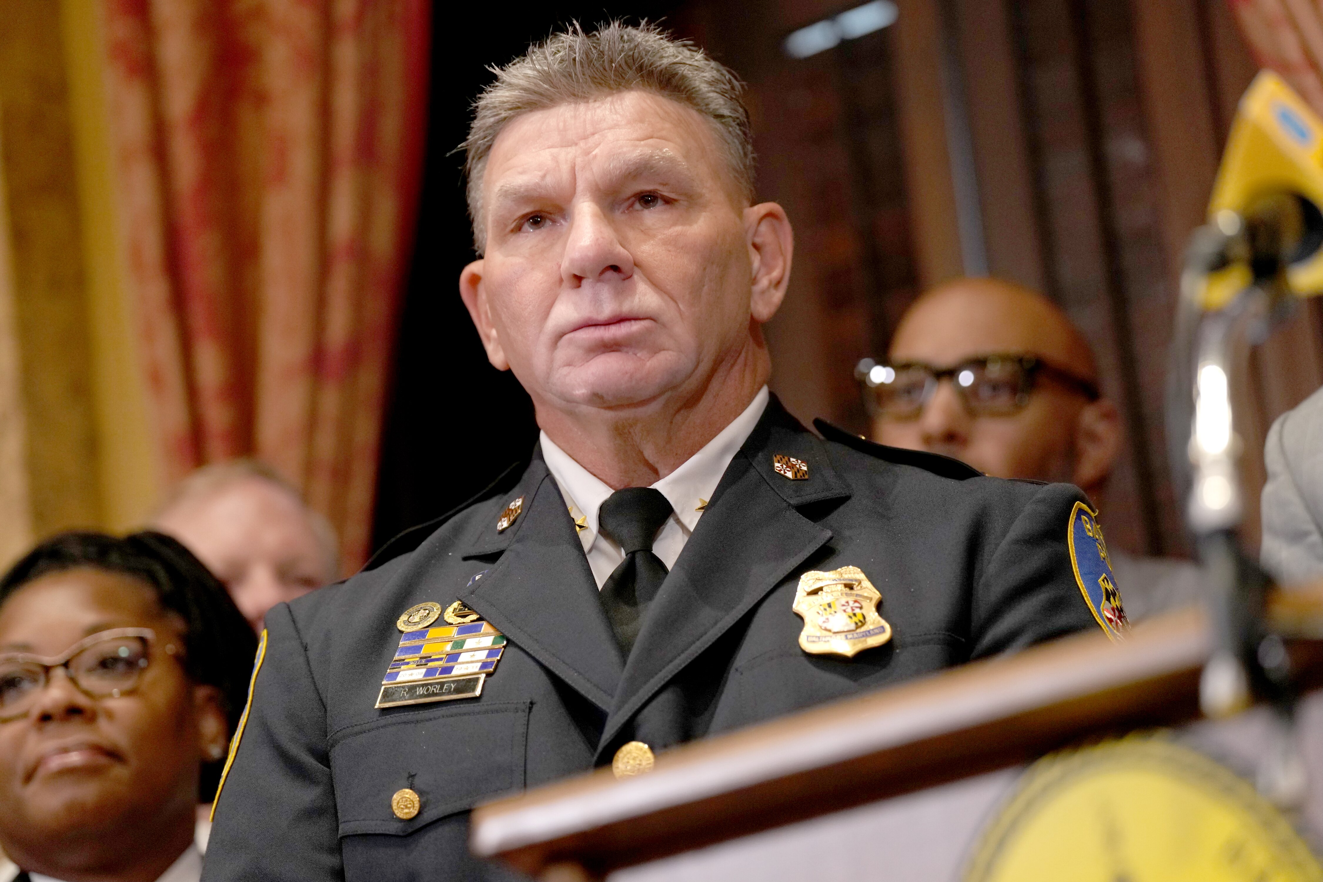 Richard Worley, Deputy Commissioner at Baltimore Police Department with Mayor Brandon Scott at the the Press conference