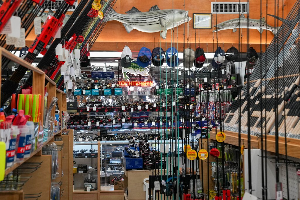 Fishing rods and related equipment line the racks inside Tochterman’s Fishing Tackle in the Fells Point neighborhood of Baltimore, Md., on Thursday, November 13, 2025.