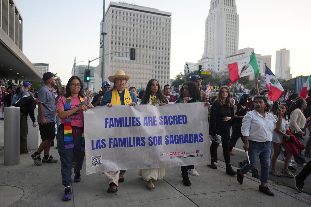 Demonstrators march during a protest Tuesday, June 10, 2025, in Los Angeles.