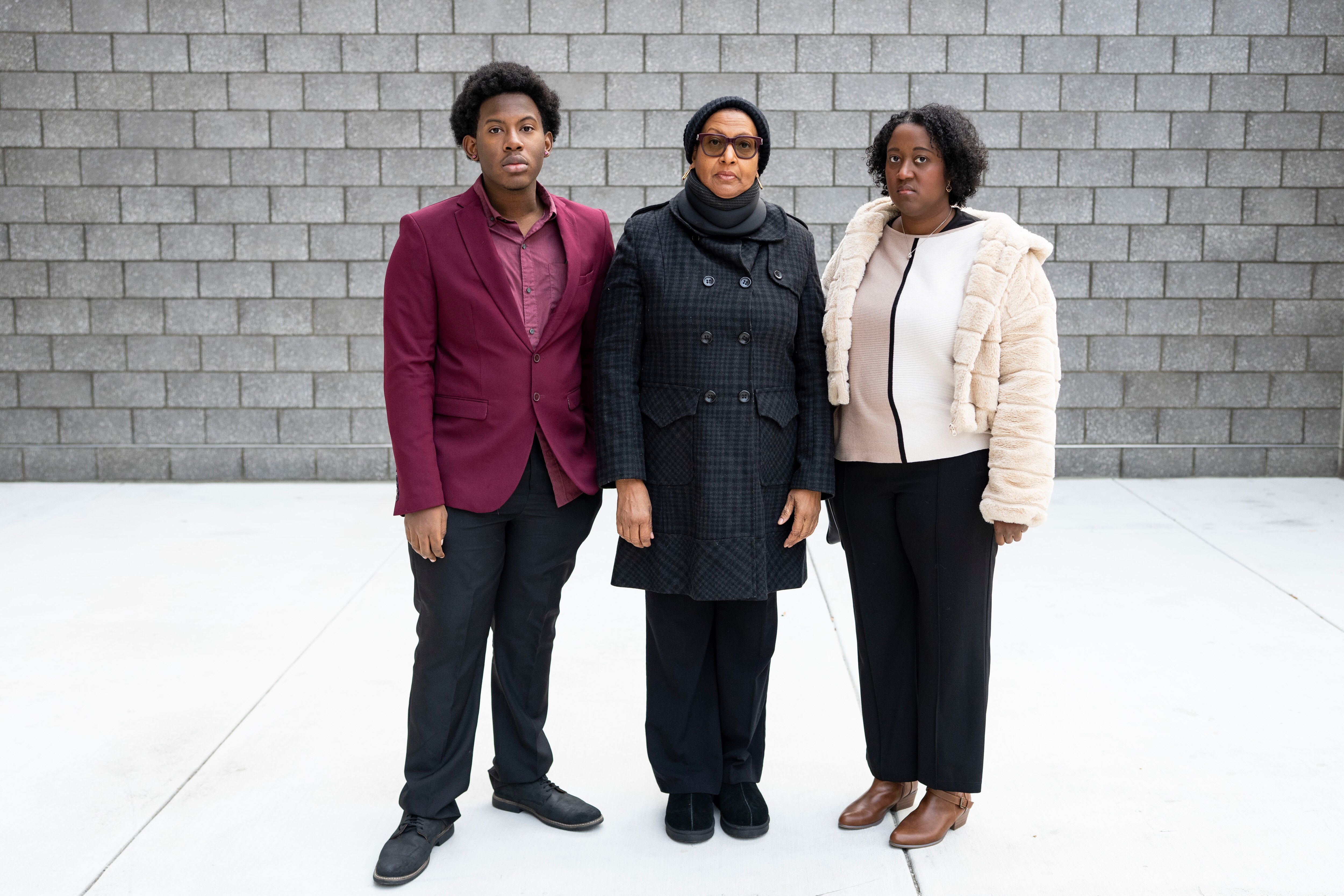 Jalen Absolum, left, joined by his mother, Avril Absolum, and sister, Janiene Smith. Jalen closed on a home on Riggs Avenue but later found a family was living there, claiming they had a lease.