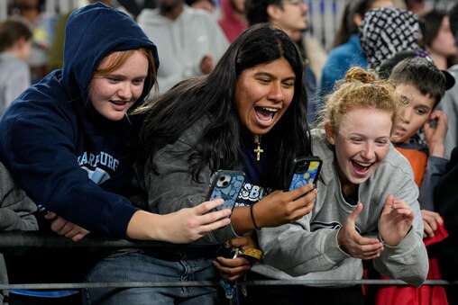 Clarksburg students cheer from the stands for their schoolmates who won the 2024 Maryland High School Girls Flag Football Championship at M&T Bank Stadium.