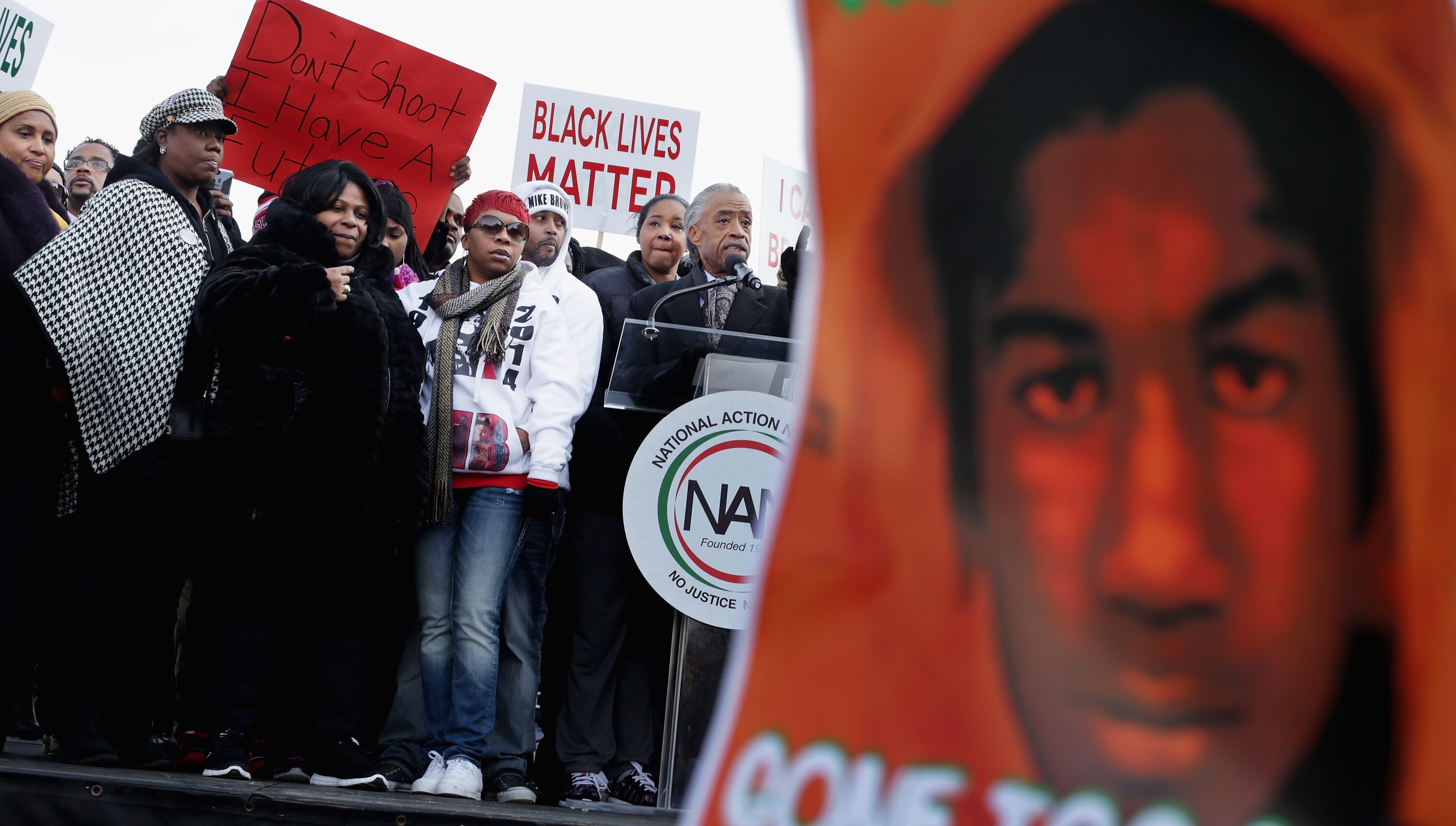 From left, Kadiatou Diallo, mother of Amadou Diallo; Sybrina Fulton, the mother of Trayvon Martin; Samaira Rice, the mother of Tamir Rice; Lesley McSpadden, the mother of Michael Brown Jr; Esaw Garner, the widow of Eric Garner; and Rev. Al Sharpton address the crowd at a "Justice For All" march and rally in Washington, D.C., in December 2014.
