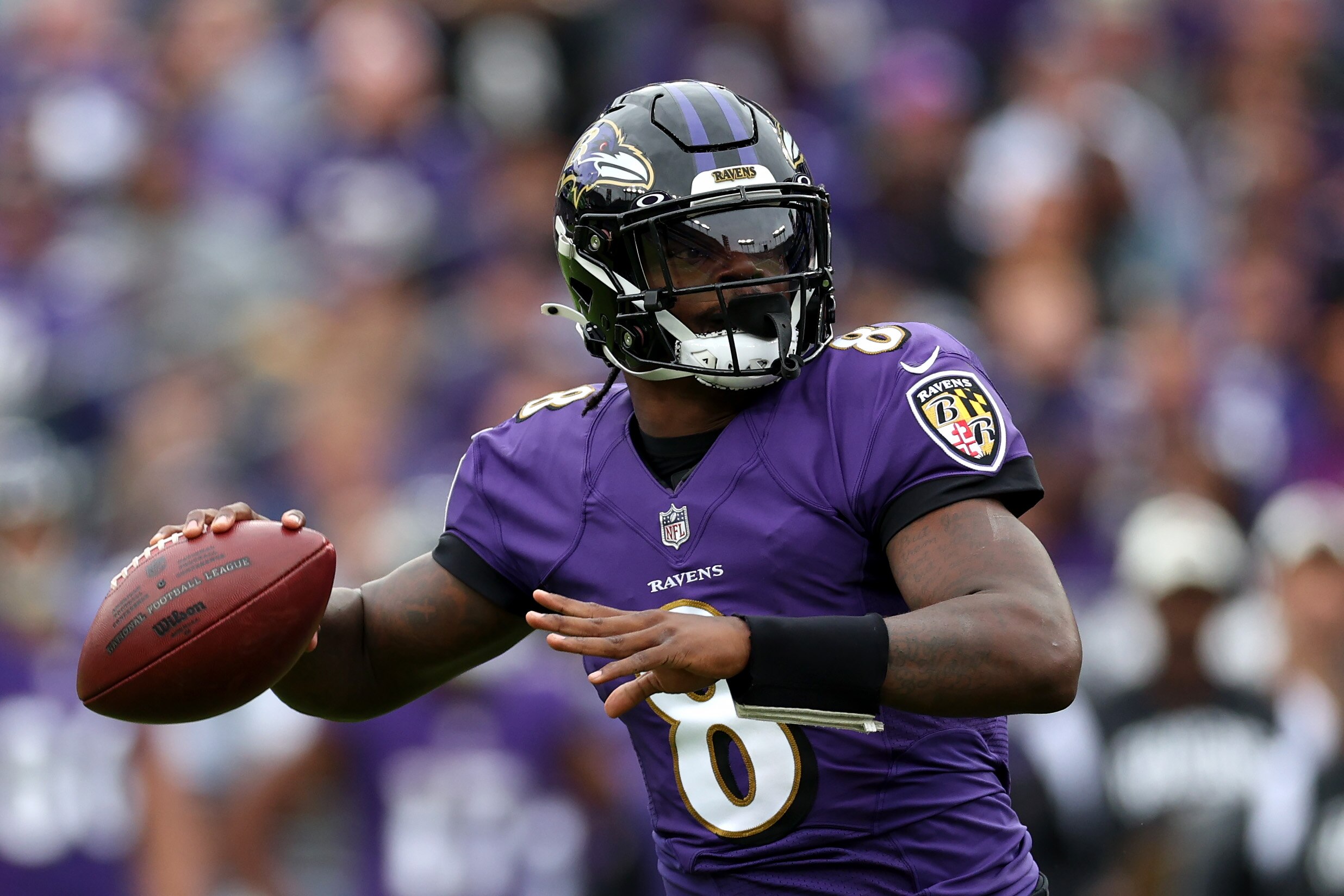 BALTIMORE, MARYLAND - OCTOBER 23: Quarterback Lamar Jackson #8 of the Baltimore Ravens drops back to pass against the Cleveland Browns at M&T Bank Stadium on October 23, 2022 in Baltimore, Maryland. (Photo by Rob Carr/Getty Images)