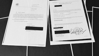 Pages that show New York grand jury subpoenas being issued into the Jeffrey Epstein and Ghislaine Maxwell investigation, then pages of redactions that follow, in this document released by the U.S. Justice Department, are photographed, Friday, Dec. 19, 2025, in Washington. (AP Photo/Jon Elswick)