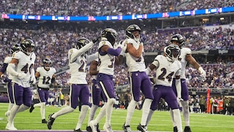 Baltimore Ravens safety Malaki Starks (24) celebrates his interception against the Minnesota Vikings in the first half of an NFL football game, Sunday, Nov. 9, 2025, in Minneapolis.