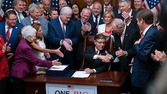 Speaker of the House Mike Johnson, R-La., center, shakes hands with Majority Leader Steve Scalise, R-La., as he celebrates with fellow Republicans after final passage of President Donald Trump's signature bill of tax breaks and spending cuts, at the Capitol in Washington, Thursday, July 3, 2025.