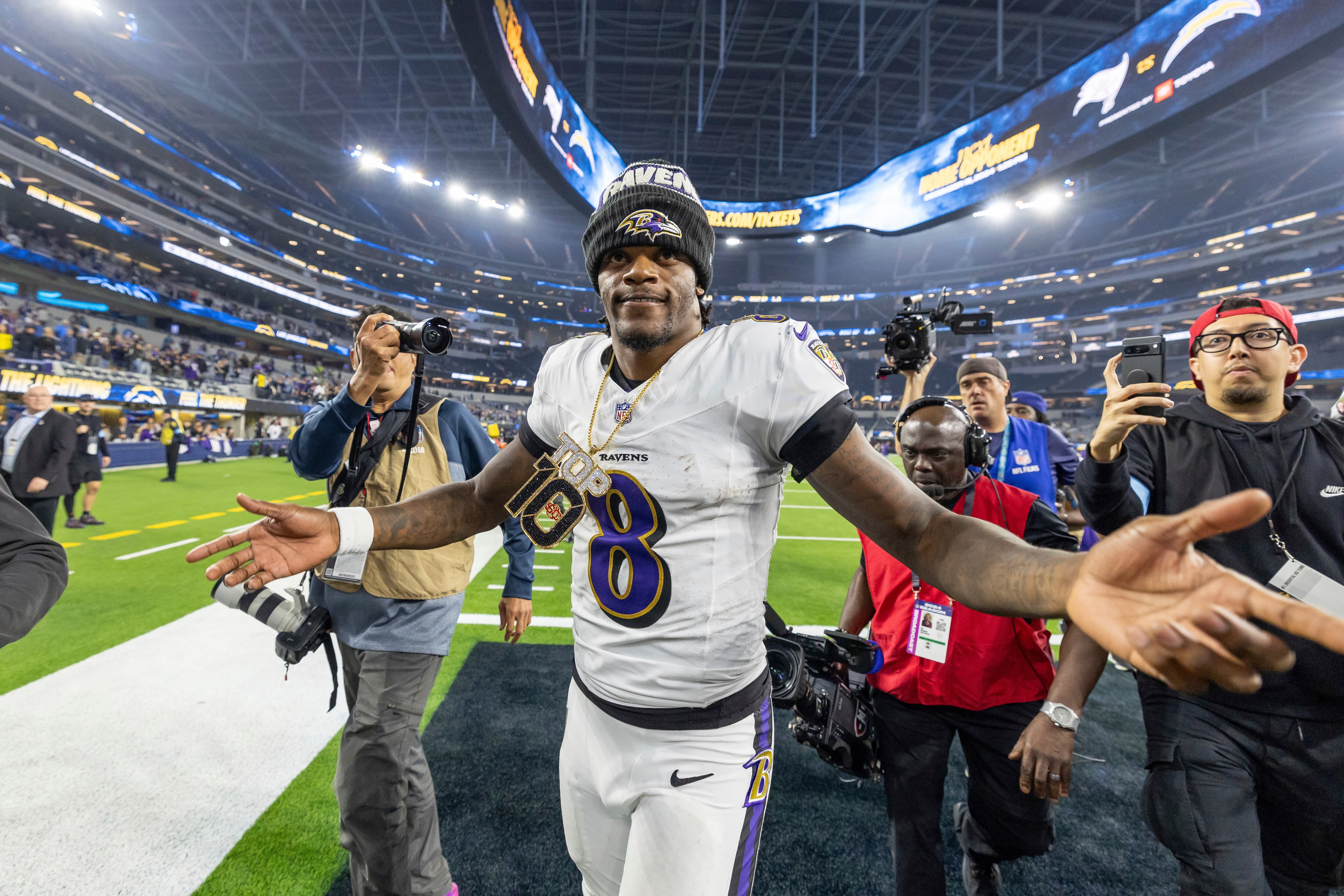 Baltimore Ravens quarterback Lamar Jackson (8) leaves the field after the Ravens defeat the Los Angeles Chargers 30-23 in an NFL football game, Monday, Nov. 25, 2024, in Inglewood, Calif.