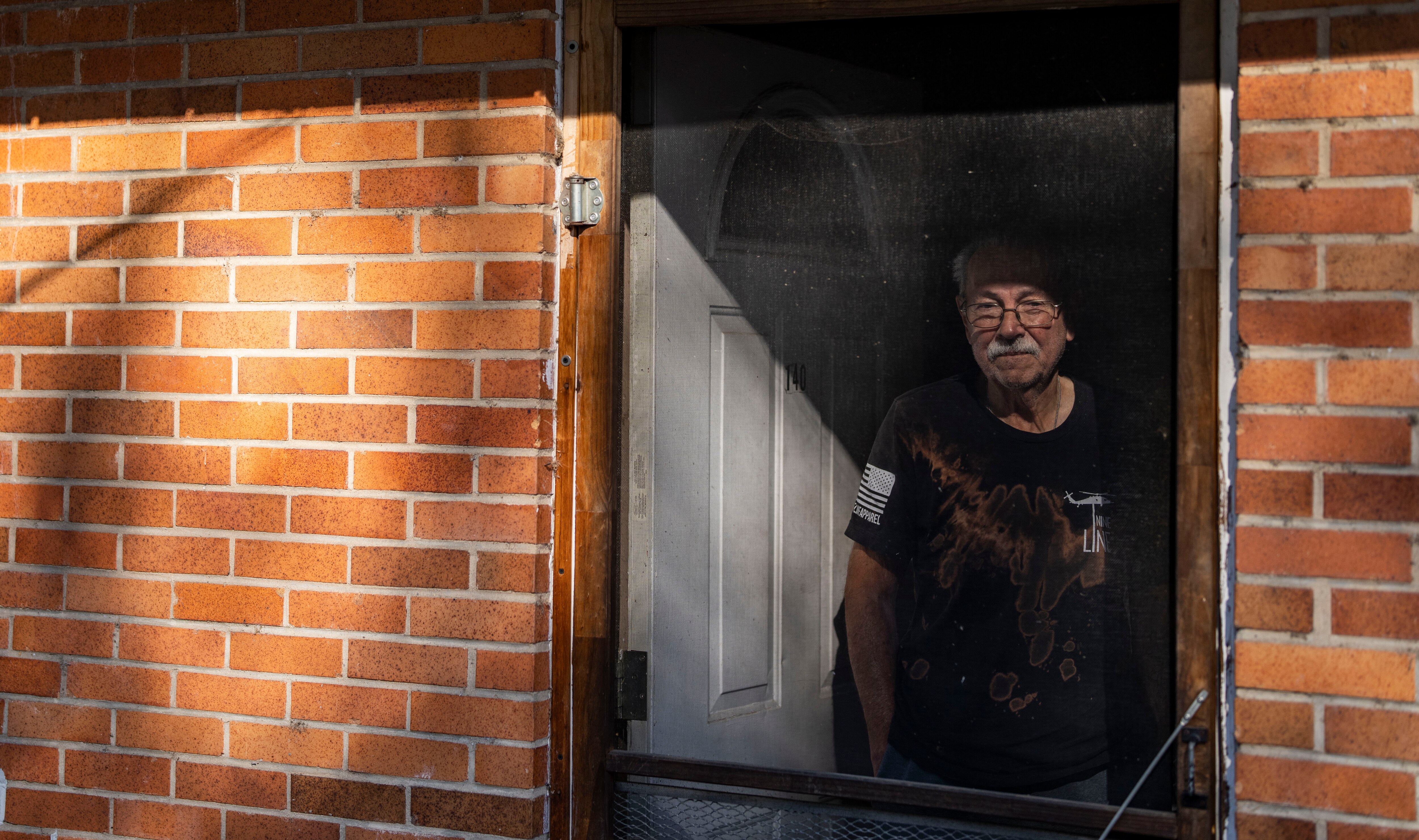 Ed Leicht, 76, in the doorway of his home at Holly Neck Boardinghouse in Essex, where he has lived since his wife died.