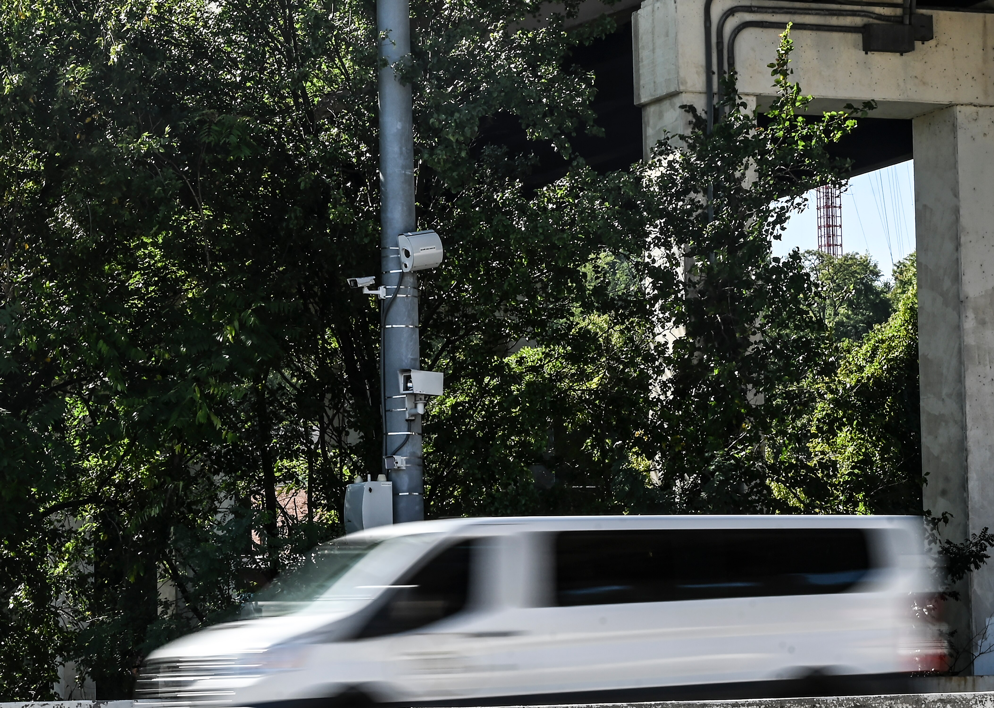 Weekend commuters zip past on of Baltimore City's speed camera on the Jones Falls Expressway on Sunday, October 1, 2023.