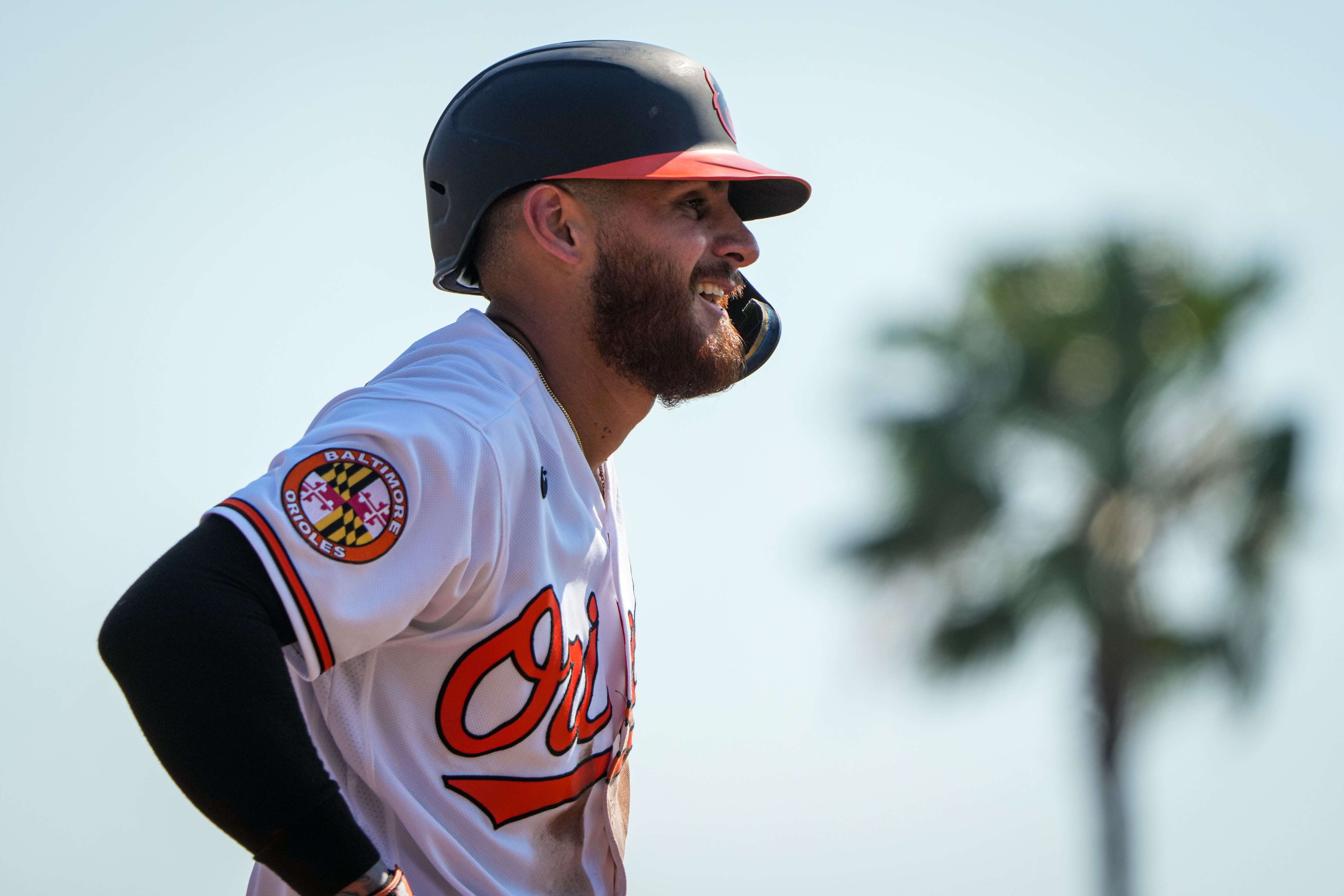 Joey Ortiz (65) smiles after tripling at Ed Smith Stadium during the 4th inning of a game against the Minnesota Twins on 2/25/23. The Baltimore Orioles hosted the Twins for their home opener as the Florida Grapefruit League started on Saturday.