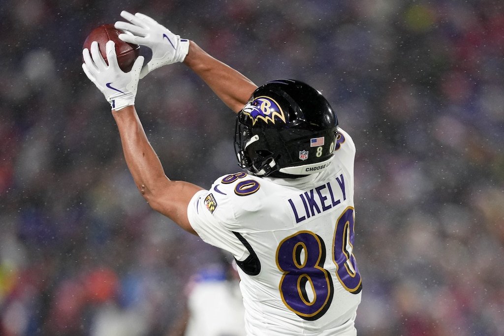 Baltimore Ravens tight end Isaiah Likely (80) catches a pass from Lamar Jackson against the Buffalo Bills in a divisional round playoff game at Highmark Stadium in Orchard Park, NY. on Sunday, January 19, 2025.