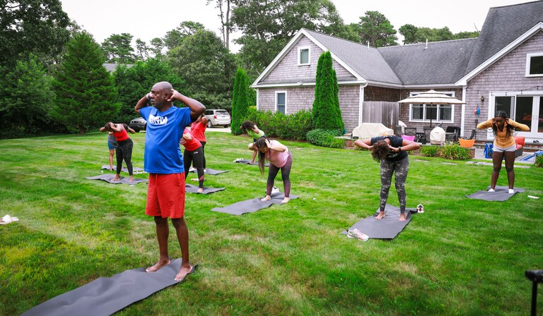 Greg Jones actively engaging in some of the hosted activities at the first Morgan On The Vineyard week in 2018. A 1979 alum of Morgan State University, Jones used to host the festivities in the backyard of his Vineyard home. Now the event, which includes receptions, a yoga class, and other programming including a state of the university address by president David K. Wilson, has grown to close to 200 participants each year and has raised more than $400,000 for the university.