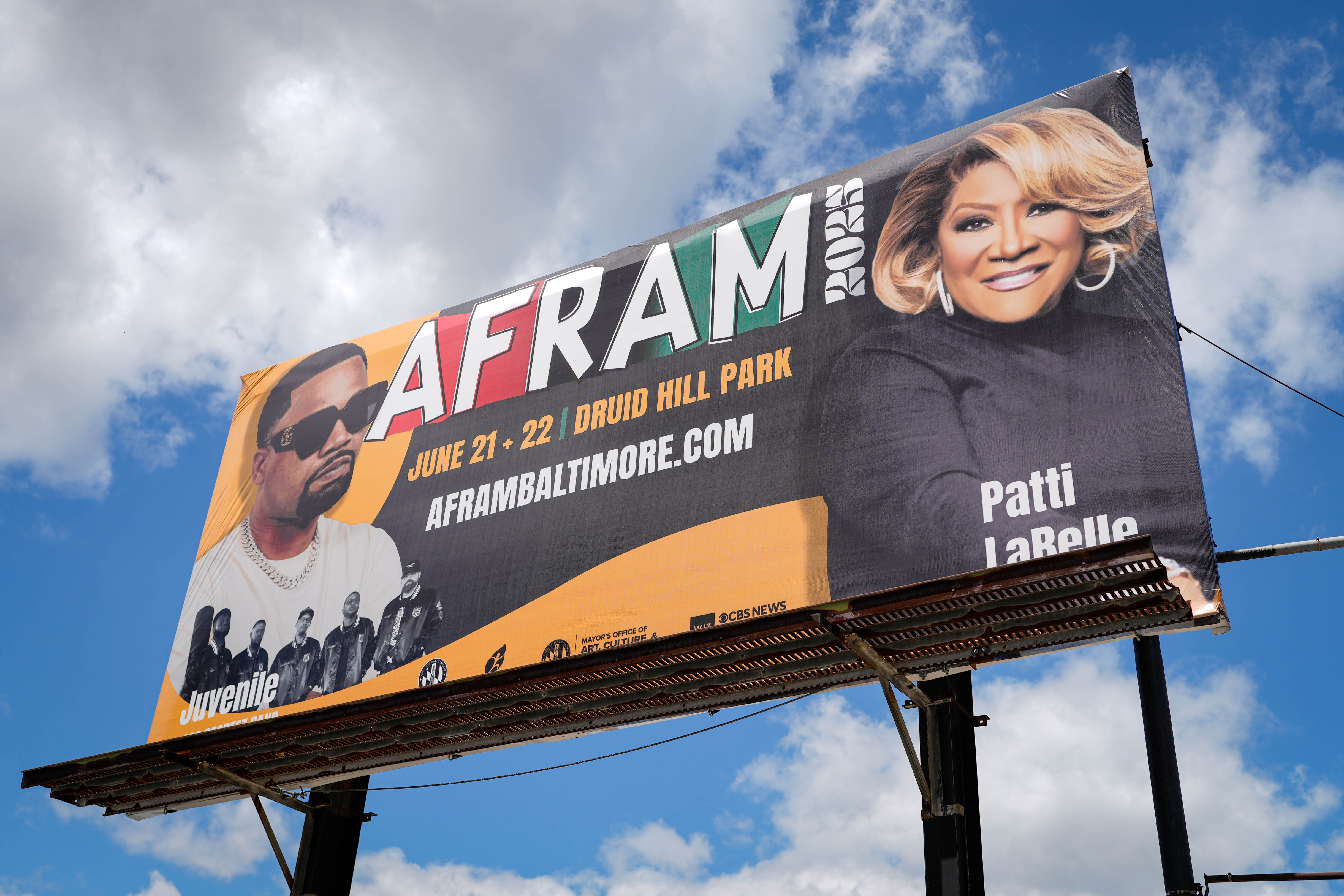 A billboard advertisement for this weekend’s AFRAM festival is seen at Artscape in downtown Baltimore.