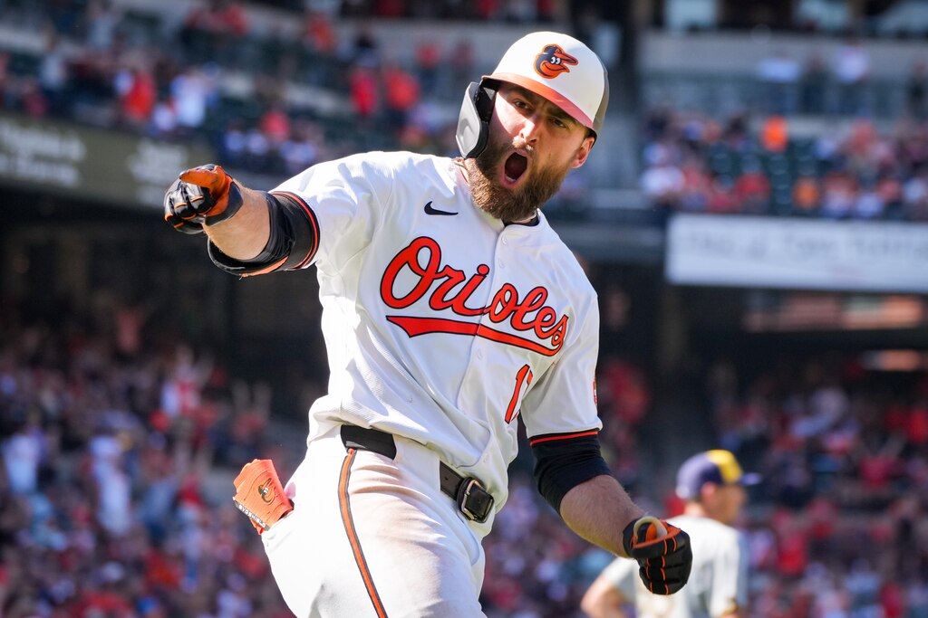 Baltimore Orioles outfielder Colton Cowser (17) points at the dugout and roars after homering during game three of a series against the Milwaukee Brewers at Camden Yards on April 14, 2024. The Orioles beat the Brewers, 6-4, to avoid getting swept in the series.