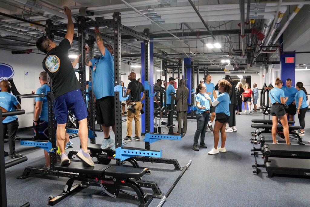 Under Armour teammates finish construction on the new gym equipment at Carver Vocational Technical High School during ‘Armour Day’ in Baltimore, Md., on Monday, Sept. 15, 2025.