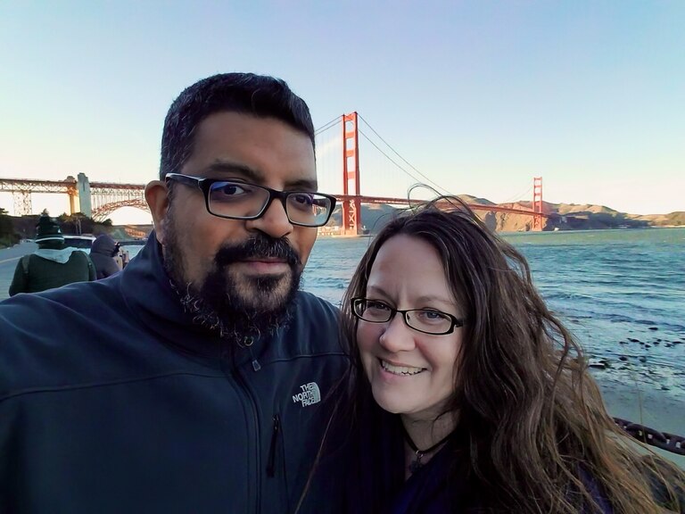 Rayman “Jim” Ally Jr. with his partner, Andrea Porkola-Case, in San Francisco.