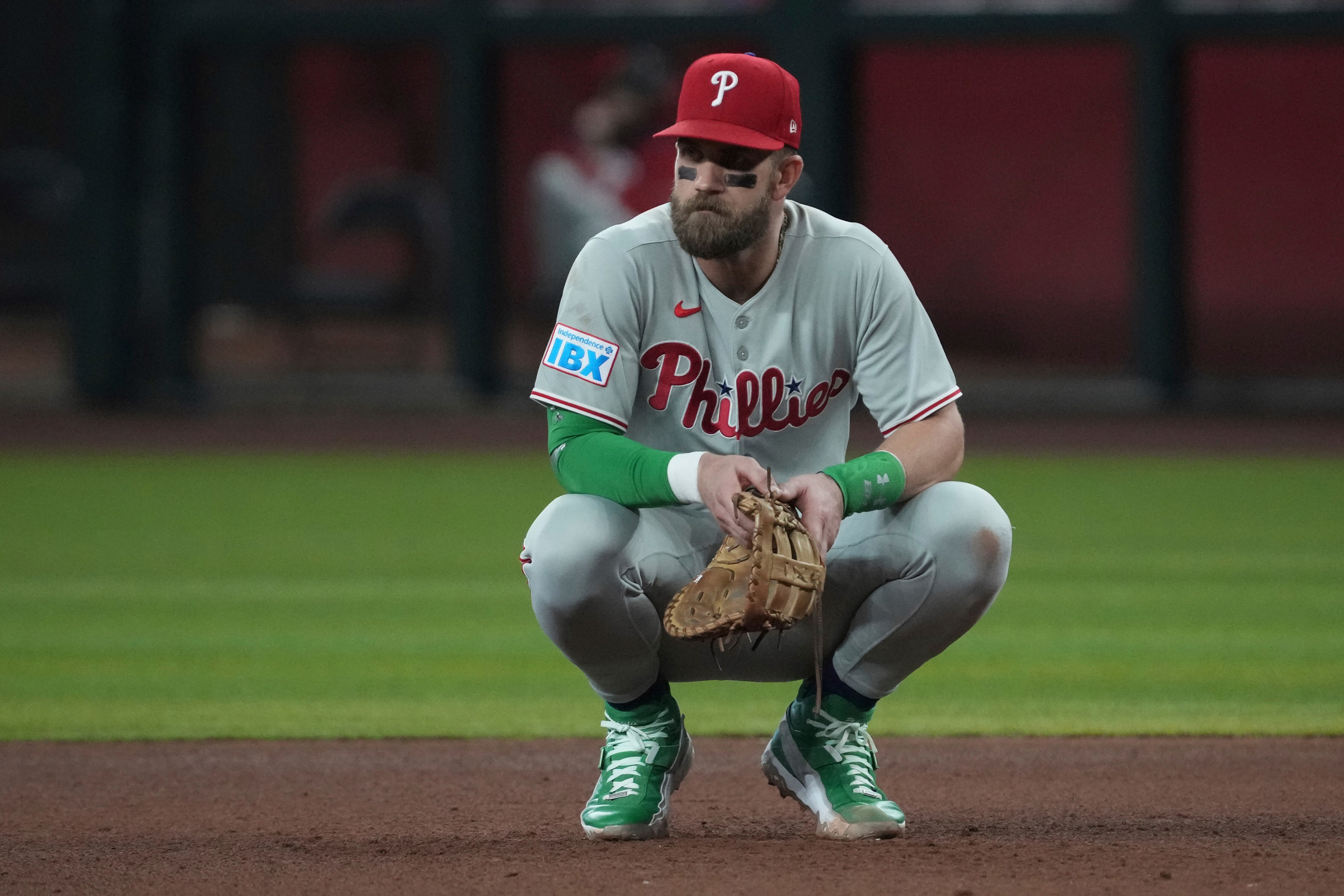 Philadelphia Phillies first base Bryce Harper (3) against the Arizona Diamondbacks in the first inning of a baseball game, Sunday, Sept. 21, 2025, in Phoenix. (AP Photo/Rick Scuteri)
