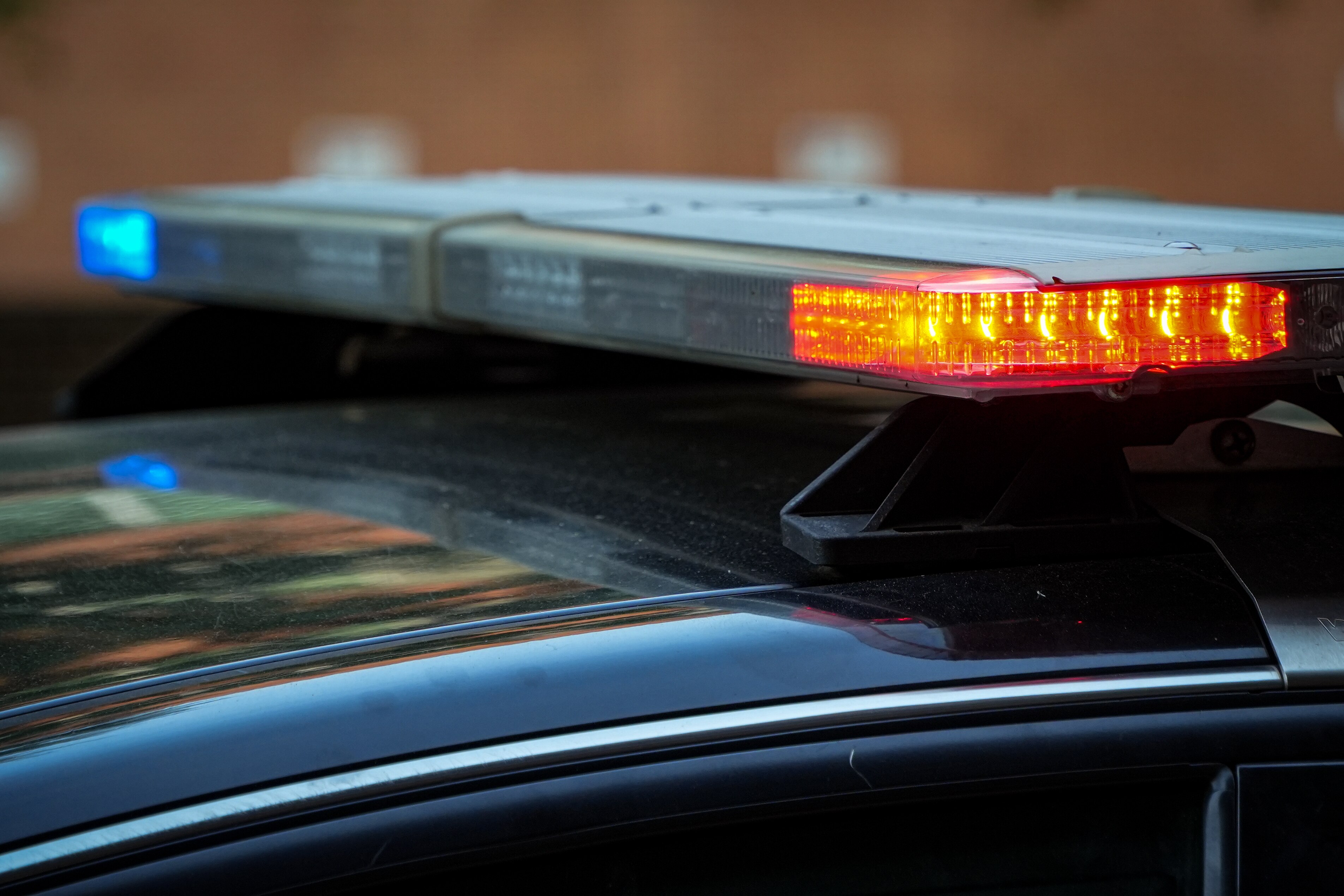 A Baltimore City Police car sits parked on North Calvert St.