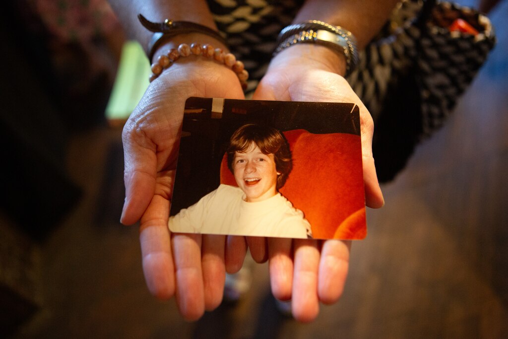 Alicia Bomhardt grew up across the street from David Herman and they became friends. She brought a photo of David – around age 12 or 13 – with her to his celebration of life on Sunday to share with other guests.