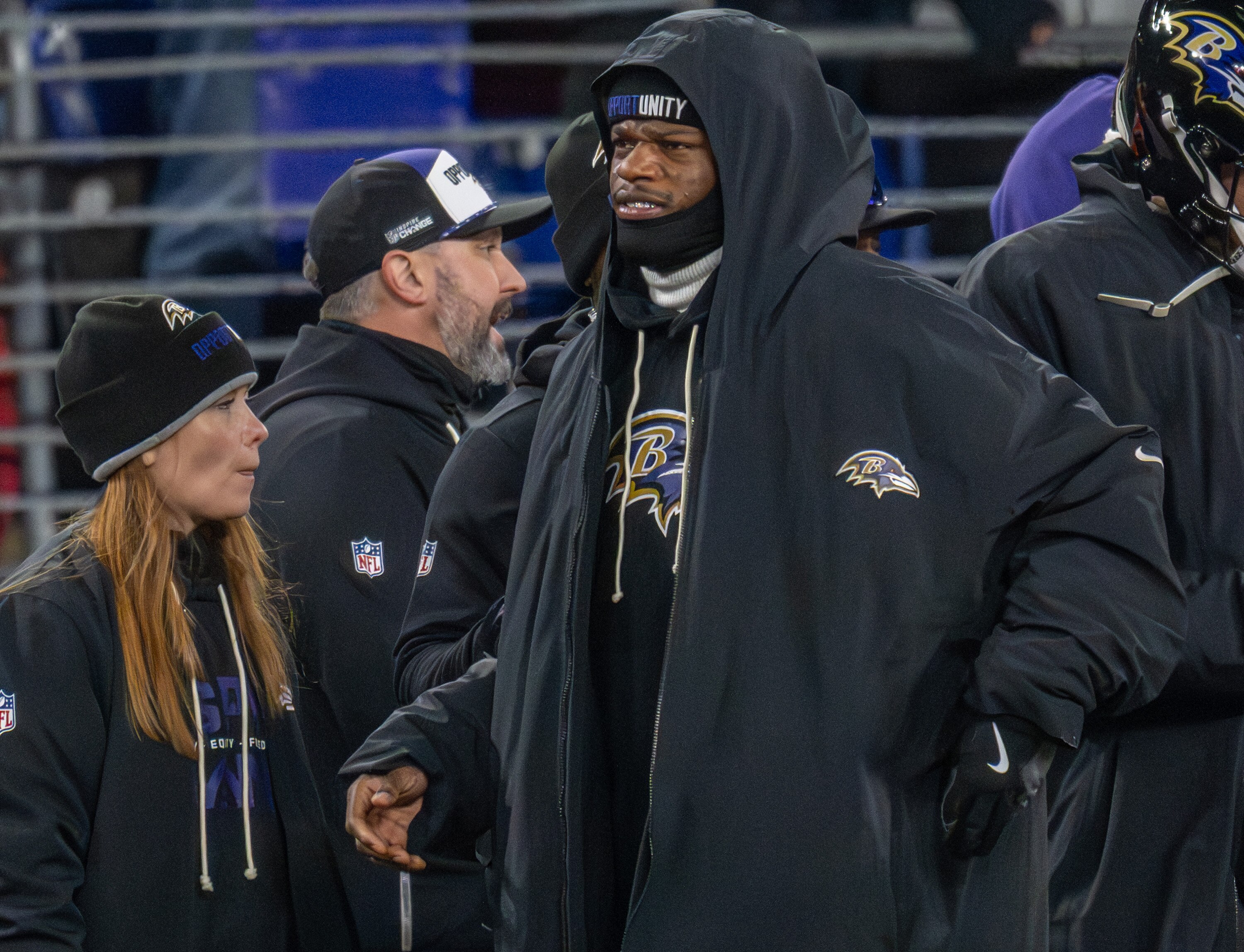 Ravens quarterback Lamar Jackson watches from the sidelines during the fourth quarter Sunday night against the Patriots.