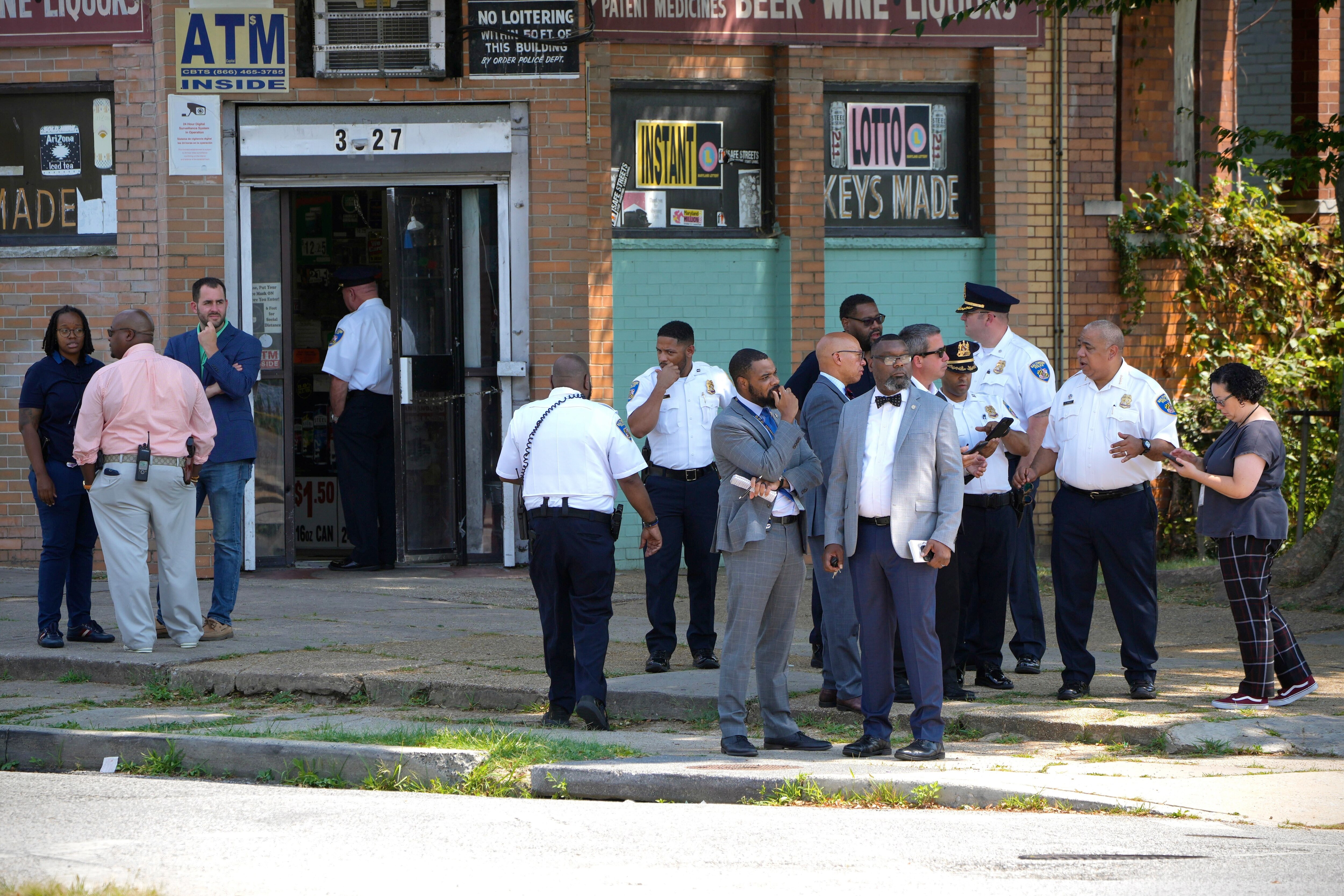 Seven people were shot — one of them fatally — on Wednesday after two individuals got out a car and began firing at a group gathered at an intersection in Northwest Baltimore