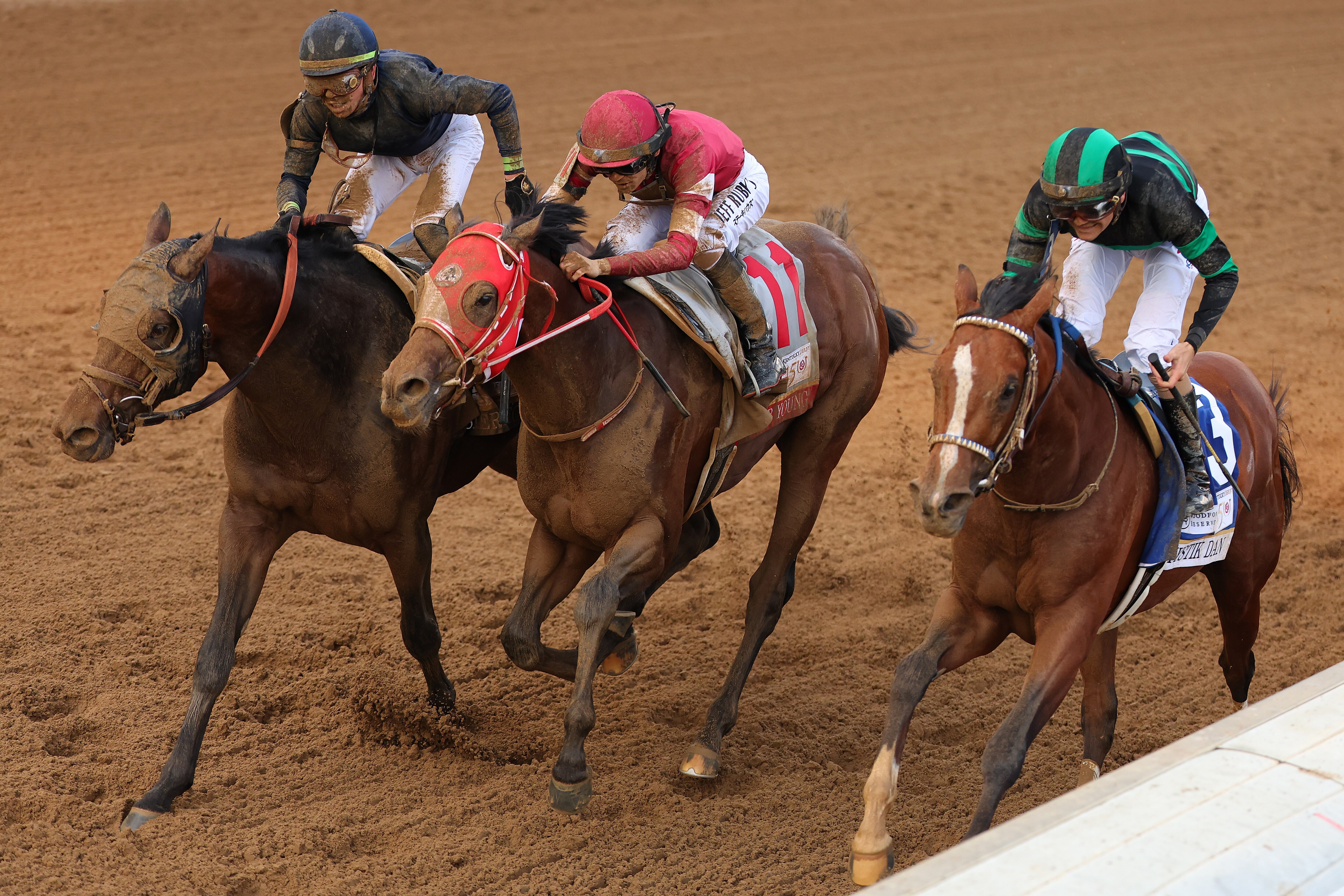 Mystik Dan (right) crosses the finish line ahead of Sierra Leone (left) and Forever Young at the Kentucky Derby on Saturday. Mystik Dan might not race at Preakness, and the other two are definitely out.