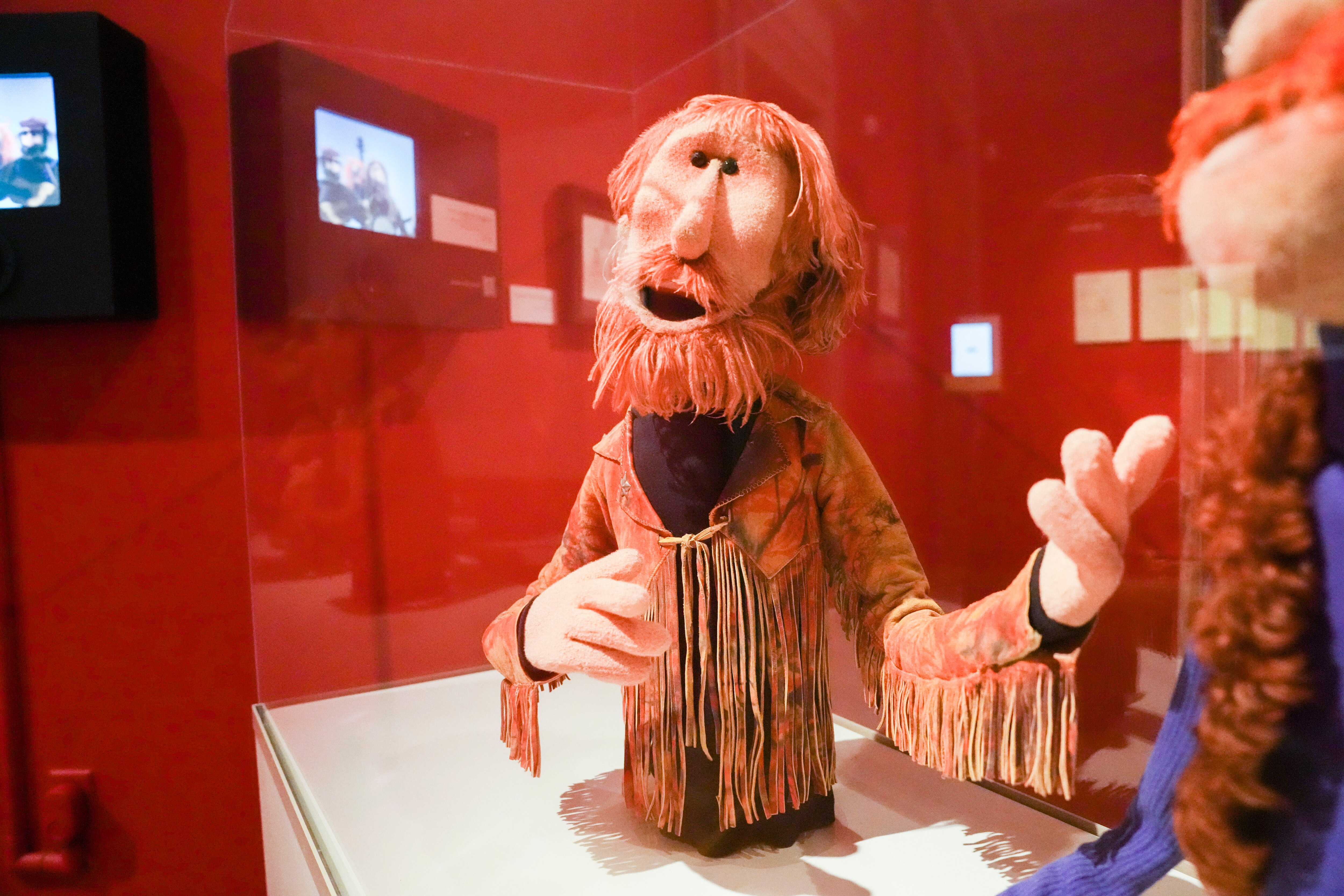A bearded puppet in a fringe jacket resembling its creator Jim Henson was among the artifacts in the Maryland Center for History and Culture's exhibit, “The Jim Henson Exhibition: Imagination Unleashed.”