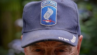 James McDonough wears a 173rd Airborne Brigade hat while posing for a portrait, Tuesday, June 10, 2025, in Crofton, Md. (AP Photo/Julia Demaree Nikhinson)