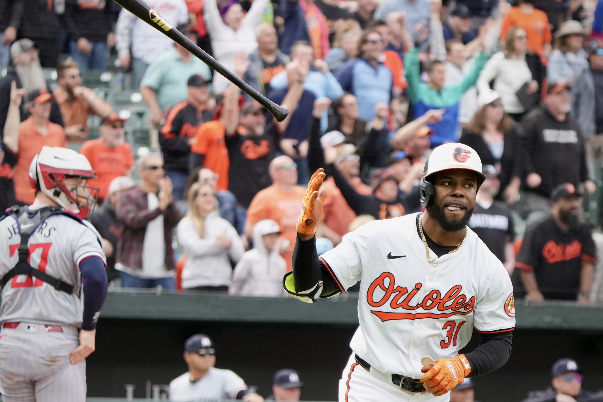 Orioles center fielder Cedric Mullins flips his bat after hitting a walk-off home run against the Minnesota Twins on Wednesday.