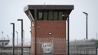 A guard tower and barbed wire are seen outside the Maryland Correctional Institution in Hagerstown on Wednesday, August 7, 2024.