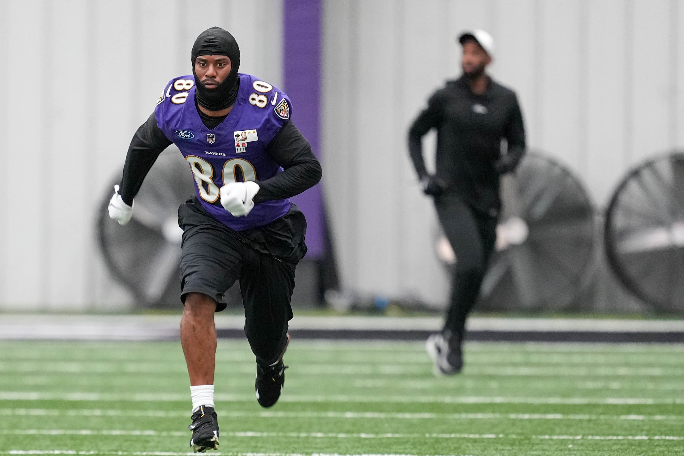 Baltimore Ravens tight end Isaiah Likely (80) runs sprints during the team’s mandatory minicamp at the Under Armour Performance Center in Owings Mills, Md. on Wednesday, June 18, 2025.