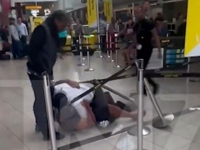 A fight between vendors working for a Spirit Airlines and a fifth person at BWI Thurgood Marshall Airport was caught on video. The four contractors working for the vendor have been suspended.