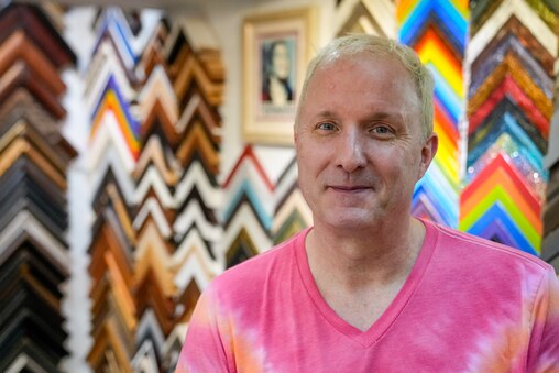 Thom Stone, one of the owners of JLP Custom Picture Framing, is photographed inside his store in Baltimore on Wednesday, October 2, 2024.