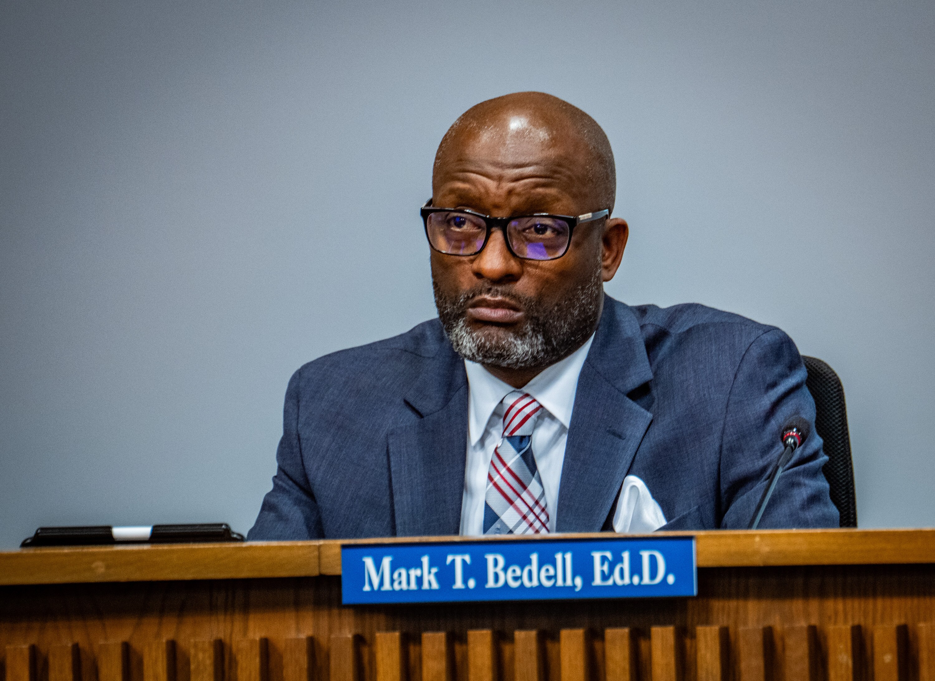 Superintendent Mark T. Bedell said the freeze would not affect school-based positions.