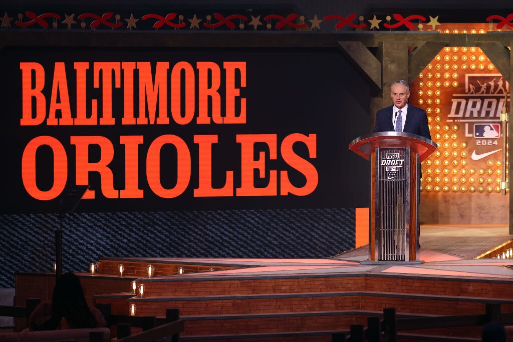 Major League Baseball commissioner Robert D. Manfred Jr. announces the pick for the Baltimore Orioles at the 2024 MLB draft on July 14. (Photo by Richard Rodriguez/Getty Images)
