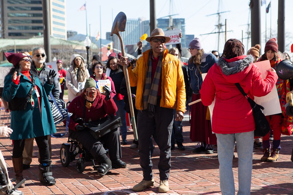 Samuel Jordan, President of the Baltimore Transit Equity Coalition, leads a Red Line light rail rally in downtown Baltimore on Tuesday, February 20th. BTEC, along with CASA and the Climate Communications Coalition aim to put pressure on Governor Wes Moore to invest in the original Red Line light rail transit plan – canceled by Larry Hogan in 2015 and since revived – over bus-rapid transit, pointing out that the light rail would have racial, economic and climate equity benefits. Speakers testified about bus delays making them late to work or school, and the need for a light rail to level the playing field for low-income Baltimore residents.