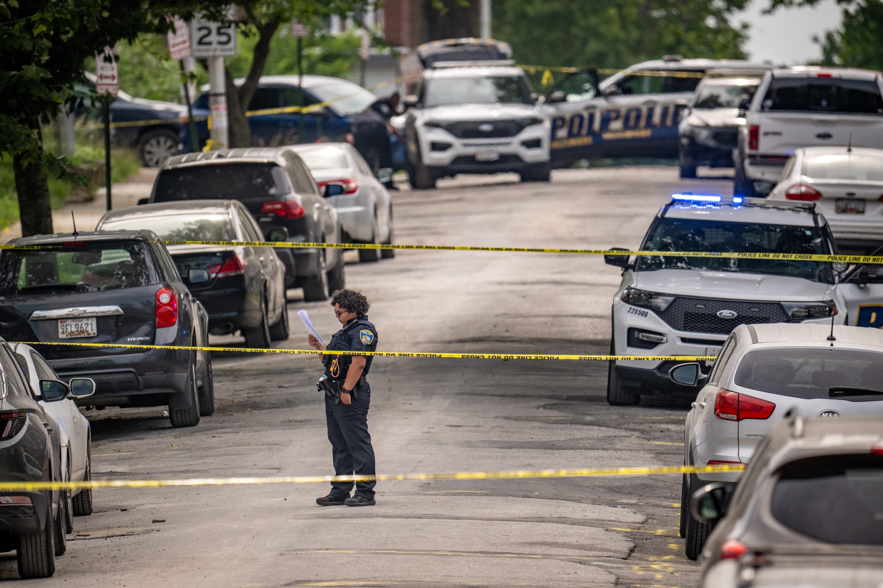Baltimore Police on scene of a police-involved shooting on the 2700 block of Mosher Street on Wednesday, June 25, 2025.