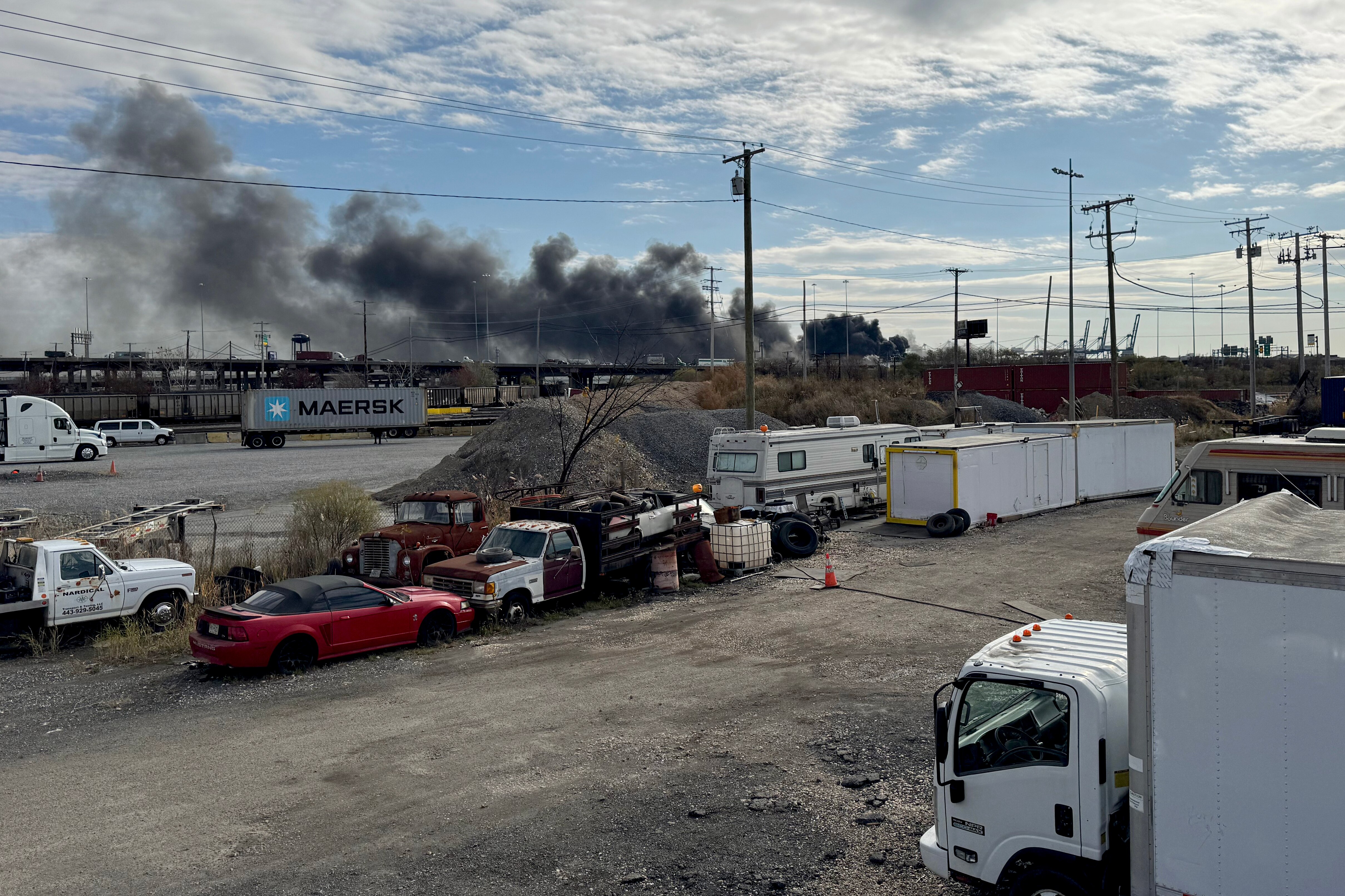 Smoke rises from a fire at the Gold Bond Building Products warehouse in the 2300 block of South Newkirk Street.