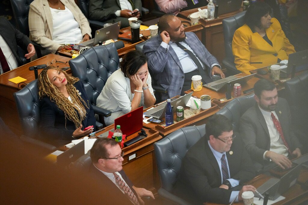 Del. Denise Roberts (left), and Del. Kym Taylor, both Prince George’s County Democrats, react during floor debate in the House Chamber of the Maryland State House on Sine Die in Annapolis, Md. on Monday, April 7, 2025.