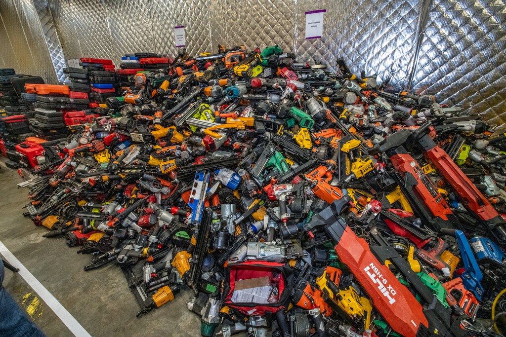 Piles of hundreds of stolen tools recovered by Howard County Police. Some may be sold in this weekend's auction.
