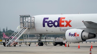 FILE - A FedEx cargo plane is shown on the tarmac at Fort Lauderdale-Hollywood International Airport, Tuesday, April 20, 2021, in Fort Lauderdale, Fla. (AP Photo/Wilfredo Lee, File)