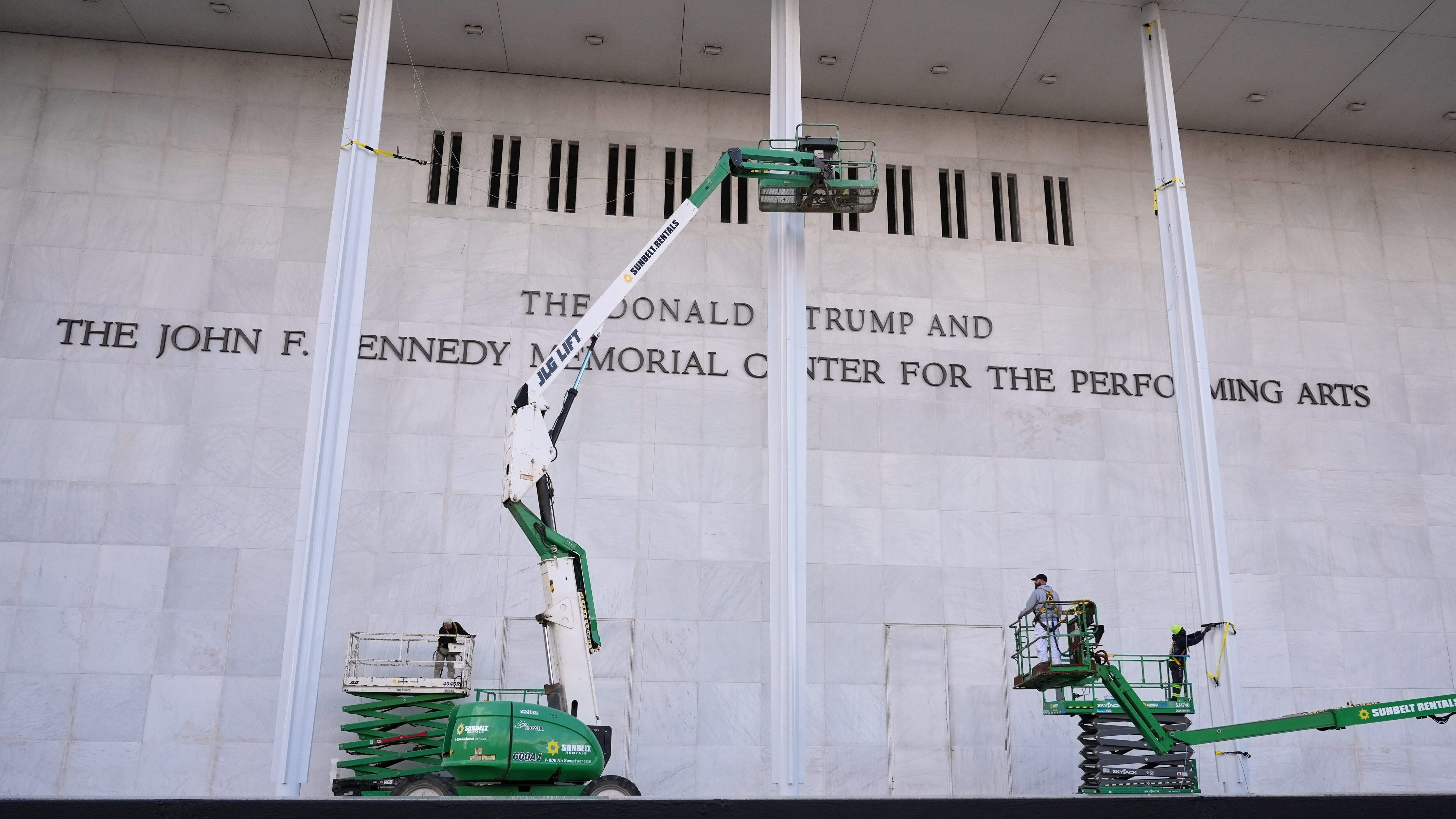 New signage, The Donald J. Trump and The John F. Kennedy Memorial Center for the Performing Arts, is unveiled on the Kennedy Center, Friday, Dec. 19, 2025, in Washington. (AP Photo/Jacquelyn Martin)