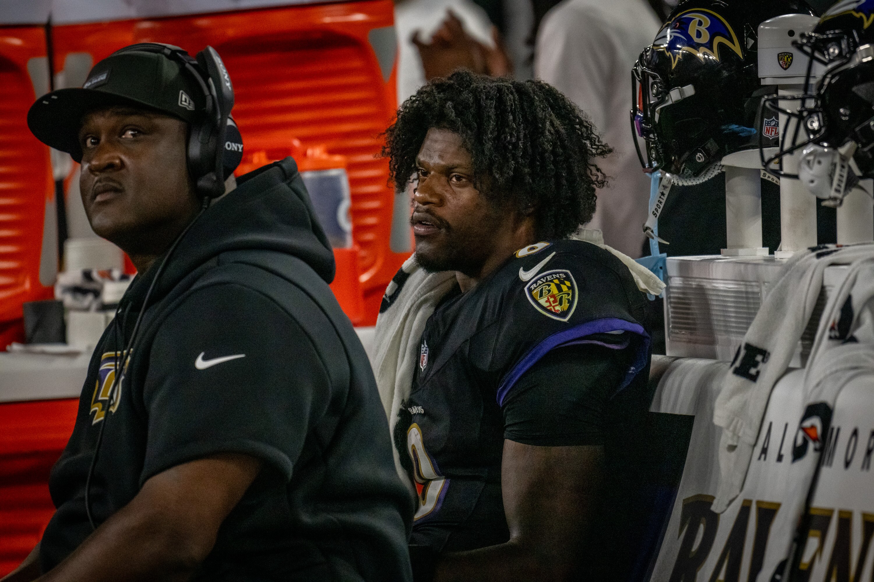 Ravens quarterback Lamar Jackson and quarterbacks coach Tee Martin watch as the Detroit Lions close out "Monday Night Football" with a win.